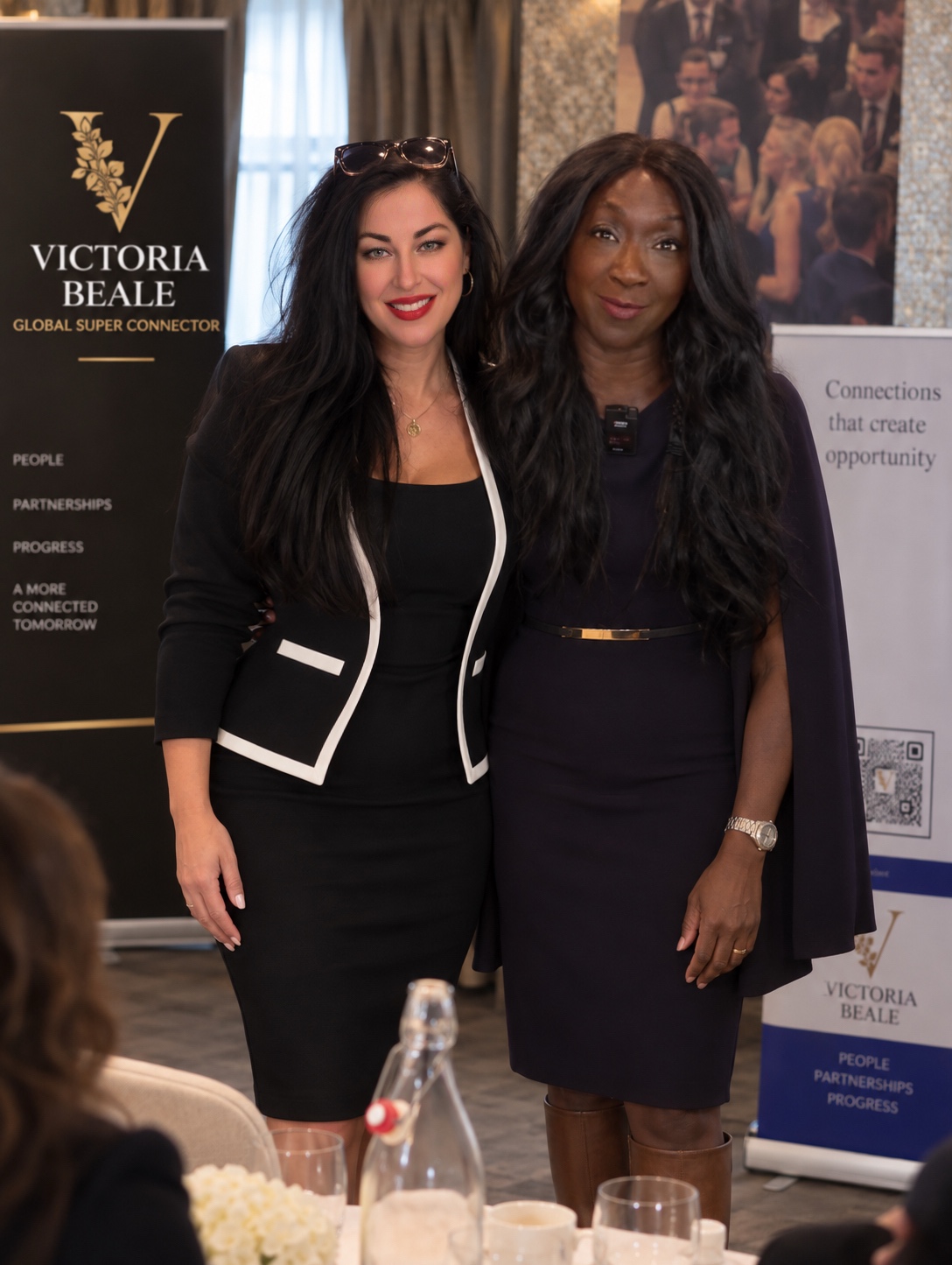 Victoria Beale with a corporate guest at a Victorious event